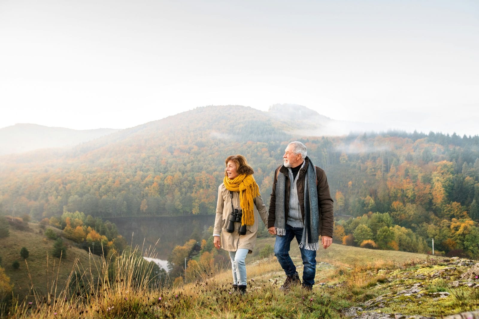 A couple walking together outdoors